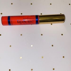 - LipSense Papaya LipGloss
